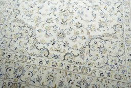 Close-up detail of New Kashan rug from Iran / Persia showing Wool weave