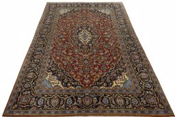 Surface texture of 2000s Kashan rug with natural Cork and intricate pattern