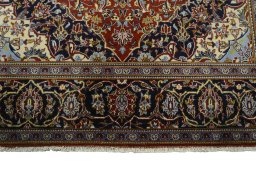 Full view of 2000s Kashan rug from Iran / Persia, 222 × 140 cm in Red tones