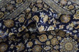 Surface texture of 2000s Kashan rug with natural Wool and intricate pattern