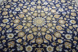 Central medallion detail of 2000s Kashan rug from Iran / Persia