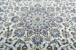 Central medallion detail of 2000s Kashan rug from Iran / Persia