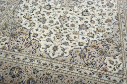 Close-up detail of 2000s Kashan rug from Iran / Persia showing Wool weave
