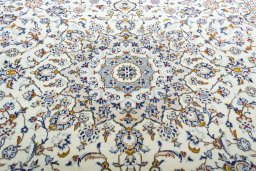 Central medallion detail of 2000s Kashan rug from Iran / Persia