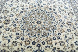 Central medallion detail of 2000s Kashan rug from Iran / Persia
