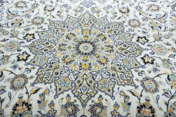 Central medallion detail of 2000s Kashan rug from Iran / Persia