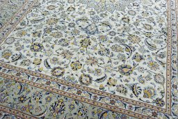 Close-up detail of 2000s Kashan rug from Iran / Persia showing Wool weave