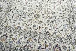 Close-up detail of 2000s Kashan rug from Iran / Persia showing Wool weave