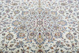 Central medallion detail of 2000s Kashan rug from Iran / Persia