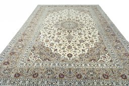 Surface texture of 2000s Kashan rug with natural Wool and intricate pattern