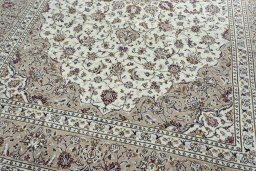 Close-up detail of 2000s Kashan rug from Iran / Persia showing Wool weave