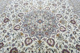 Central medallion detail of 2000s Kashan rug from Iran / Persia