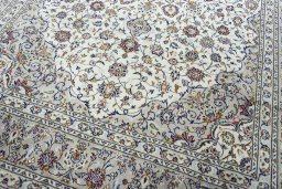 Close-up detail of 2000s Kashan rug from Iran / Persia showing Wool weave