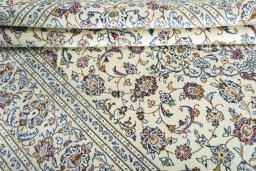 Close-up detail of 2000s Kashan rug from Iran / Persia showing Wool weave