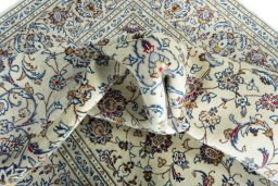 Surface texture of 2000s Kashan rug with natural Wool and intricate pattern
