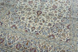 Close-up detail of 2000s Kashan rug from Iran / Persia showing Wool weave