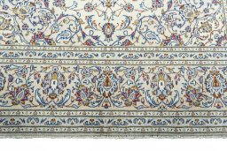 Full view of 2000s Kashan rug from Iran / Persia, 303 × 200 cm in Beige tones