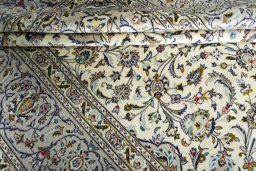 Close-up detail of 2000s Kashan rug from Iran / Persia showing Wool weave