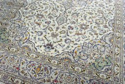 Close-up detail of 2000s Kashan rug from Iran / Persia showing Wool weave
