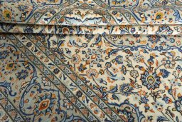 Close-up detail of 2000s Kashan rug from Iran / Persia showing Wool weave