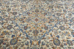 Central medallion detail of 2000s Kashan rug from Iran / Persia