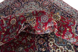 Surface texture of 2000s Kashan rug with natural Wool and intricate pattern