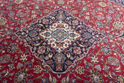 Central medallion detail of 2000s Kashan rug from Iran / Persia