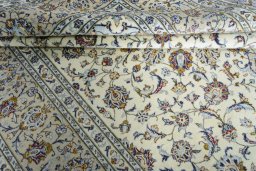 Close-up detail of 2000s Kashan rug from Iran / Persia showing Wool weave