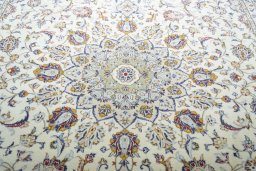 Central medallion detail of 2000s Kashan rug from Iran / Persia