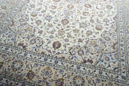 Close-up detail of 2000s Kashan rug from Iran / Persia showing Wool weave