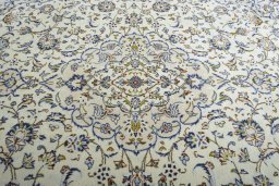 Central medallion detail of 2000s Kashan rug from Iran / Persia