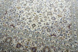 Close-up detail of 2000s Kashan rug from Iran / Persia showing Wool weave