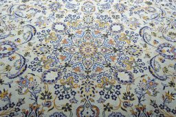 Central medallion detail of 2000s Kashan rug from Iran / Persia