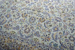 Close-up detail of 2000s Kashan rug from Iran / Persia showing Wool weave