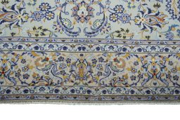 Full view of 2000s Kashan rug from Iran / Persia, 422 × 292 cm in Green tones