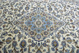 Central medallion detail of 2000s Kashan rug from Iran / Persia