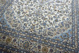 Close-up detail of 2000s Kashan rug from Iran / Persia showing Wool weave