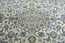 Central medallion detail of 2000s Kashan rug from Iran / Persia