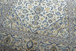 Close-up detail of 2000s Kashan rug from Iran / Persia showing Wool weave