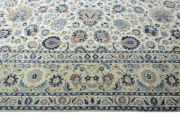 Corner detail of 1950s Kashan rug showing border pattern and Wool pile