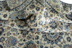 Surface texture of 1950s Kashan rug with natural Wool and intricate pattern