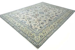 Corner detail of 1950s Kashan rug showing border pattern and Wool pile