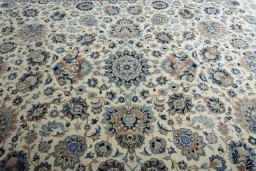 Central medallion detail of 1950s Kashan rug from Iran / Persia