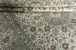 Close-up detail of 2000s Kashan rug from Iran / Persia showing Wool weave