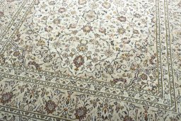 Close-up detail of 2000s Kashan rug from Iran / Persia showing Wool weave