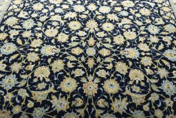Central medallion detail of 2000s Kashan rug from Iran / Persia