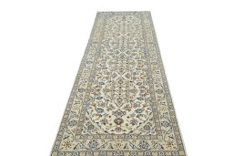 Surface texture of 2000s Kashan rug with natural Wool and intricate pattern