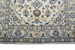 Central medallion detail of 2000s Kashan rug from Iran / Persia