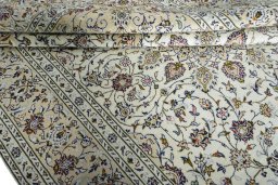 Close-up detail of 2000s Kashan rug from Iran / Persia showing Wool weave