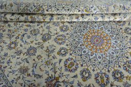 Close-up detail of 2000s Kashan rug from Iran / Persia showing Wool weave